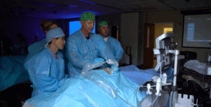 Four CRNA Students placing needle in cadaver