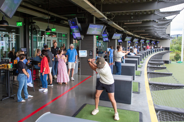 CRNA students having tournament at topgolf - male golfer